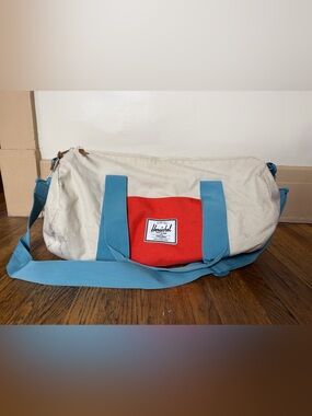 Herschel Supply Company Cream, Orange, & Blue Canvas Duffel Bag